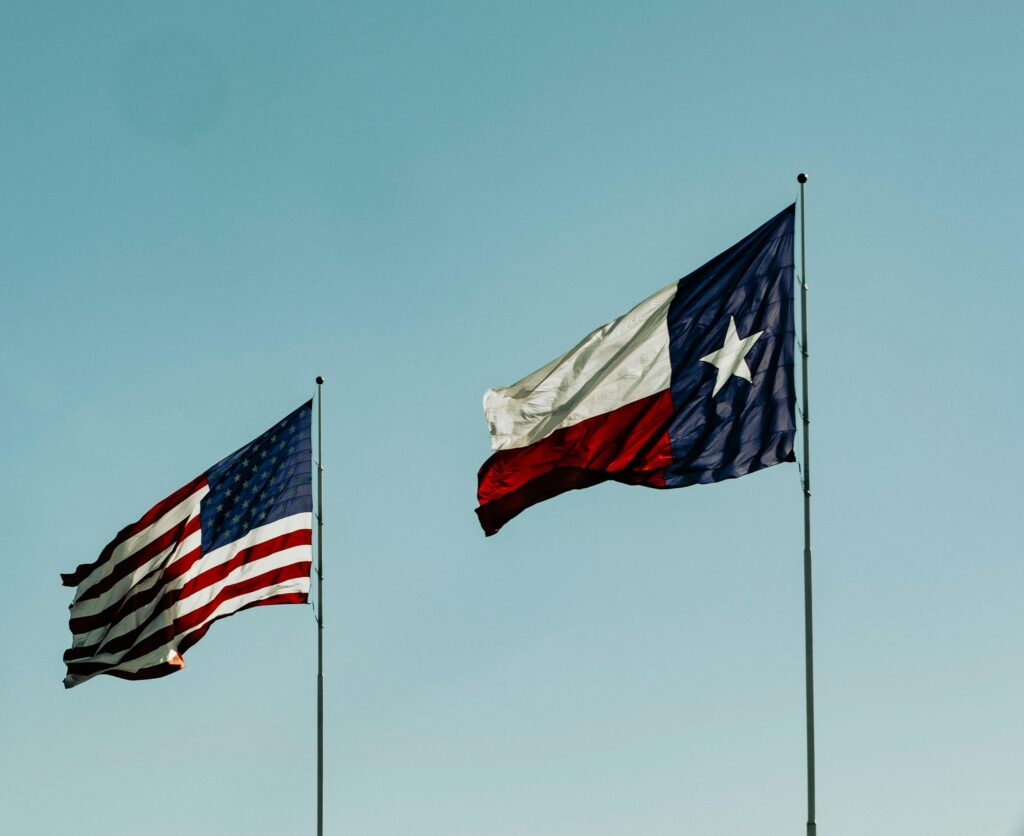 American flag next to texan flag