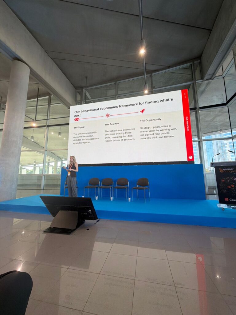 Emily presenting at the ESOMAR conference